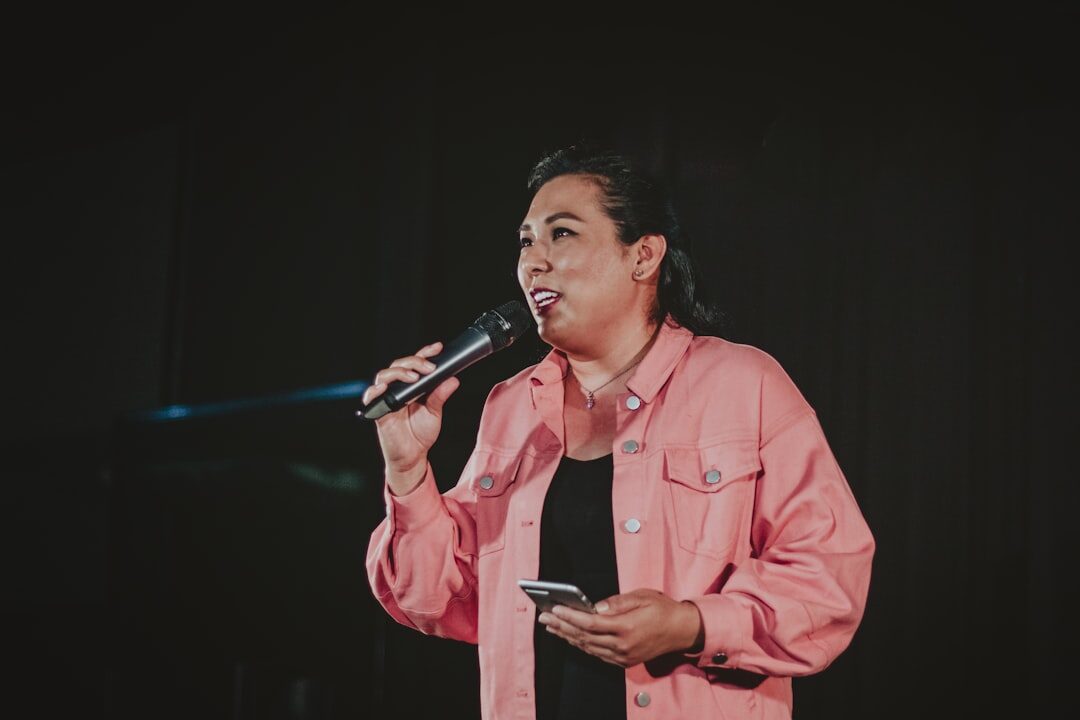 person on stage speaking